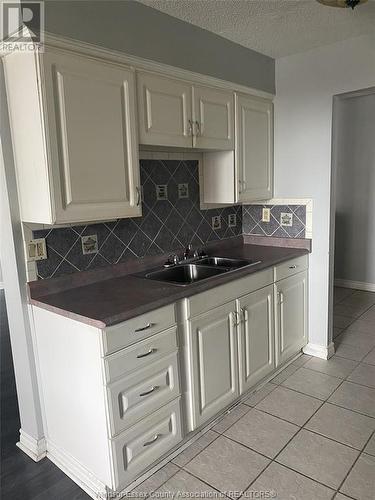 150 Park Unit# 802, Windsor, ON - Indoor Photo Showing Kitchen With Double Sink