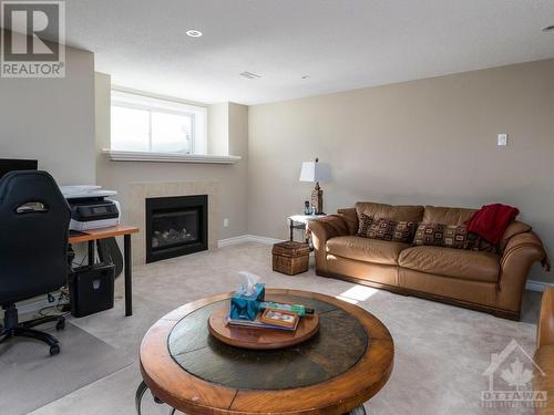 800 Fletcher Circle, Ottawa, ON - Indoor Photo Showing Living Room With Fireplace