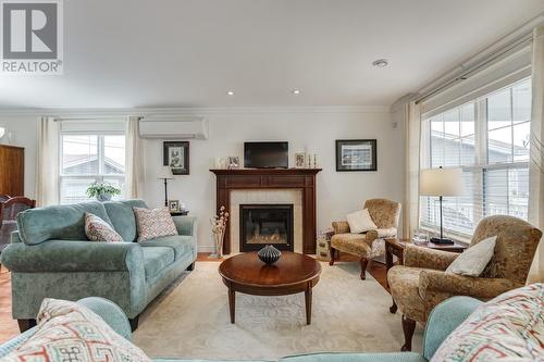 31 Hollyberry Drive, Paradise, NL - Indoor Photo Showing Living Room With Fireplace