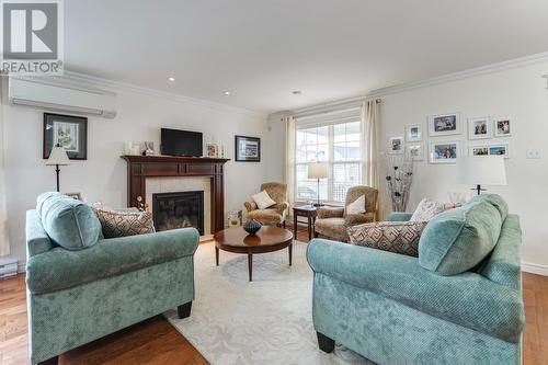 31 Hollyberry Drive, Paradise, NL - Indoor Photo Showing Living Room With Fireplace