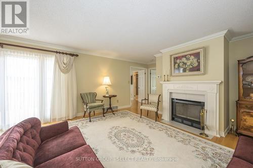 12 - 65 Fiddlers Green Road, London, ON - Indoor Photo Showing Living Room With Fireplace