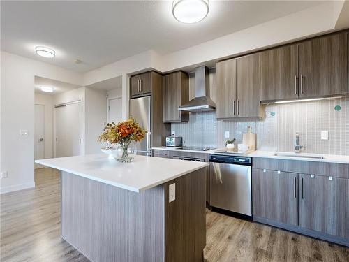 3 Seater kitchen island - 2093 Fairview Street|Unit #201, Burlington, ON - Indoor Photo Showing Kitchen With Upgraded Kitchen