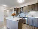 3 Seater kitchen island - 2093 Fairview Street|Unit #201, Burlington, ON  - Indoor Photo Showing Kitchen With Upgraded Kitchen 