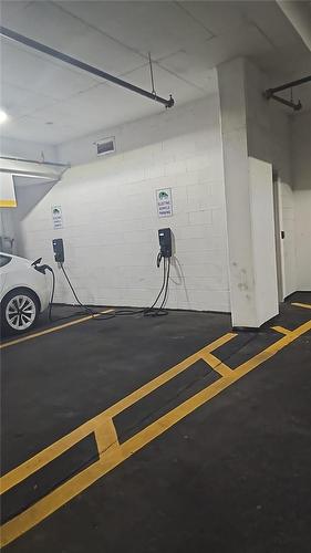 EV Charging - 2093 Fairview Street|Unit #201, Burlington, ON - Indoor Photo Showing Garage