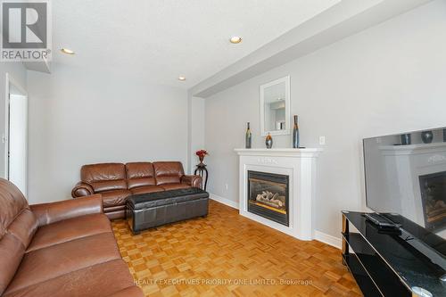 223 Caproni Drive, Vaughan (Maple), ON - Indoor Photo Showing Living Room With Fireplace