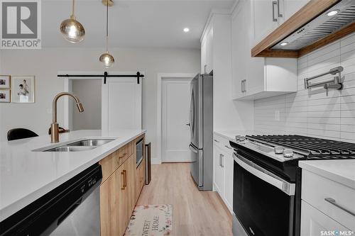 936 Feheregyhazi Boulevard, Saskatoon, SK - Indoor Photo Showing Kitchen With Double Sink With Upgraded Kitchen