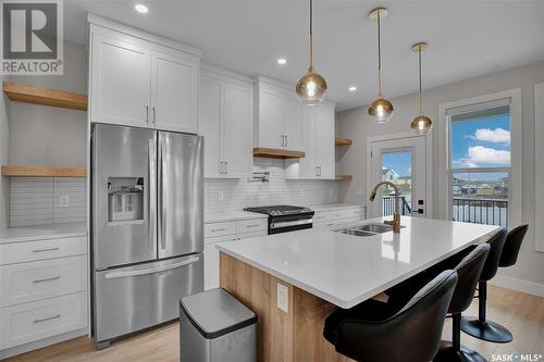 936 Feheregyhazi Boulevard, Saskatoon, SK - Indoor Photo Showing Kitchen With Double Sink With Upgraded Kitchen