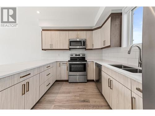 210 Scott Avenue Unit# 102, Penticton, BC - Indoor Photo Showing Kitchen With Double Sink With Upgraded Kitchen