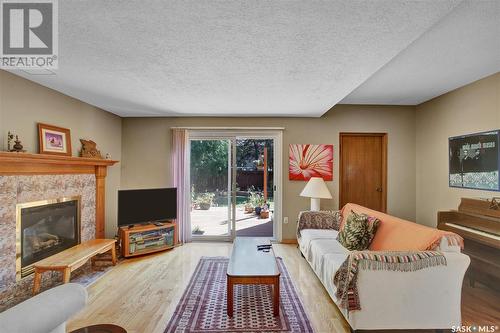 202 Kenosee Crescent, Saskatoon, SK - Indoor Photo Showing Living Room With Fireplace