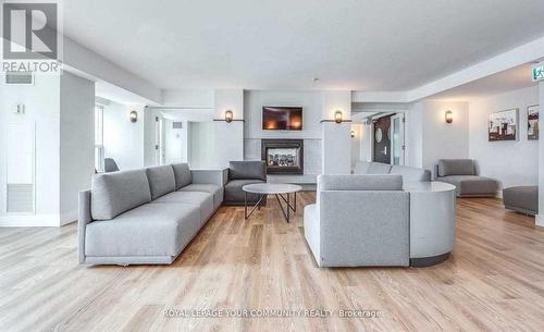 707 - 323 Richmond Street E, Toronto (Moss Park), ON - Indoor Photo Showing Living Room With Fireplace