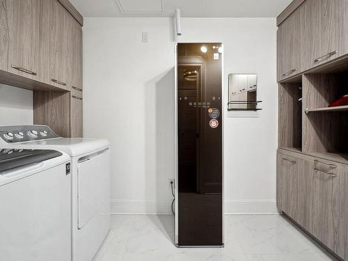 Salle de lavage - 204-1255 Rue Des Francs-Bourgeois, Boisbriand, QC - Indoor Photo Showing Laundry Room