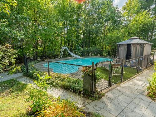 Piscine - 450 Rue Montmagny, Sherbrooke (Les Nations), QC - Outdoor With In Ground Pool With Backyard