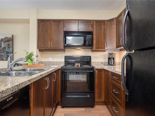 308-297 Hirst Ave West, Parksville, BC - Indoor Photo Showing Kitchen With Double Sink