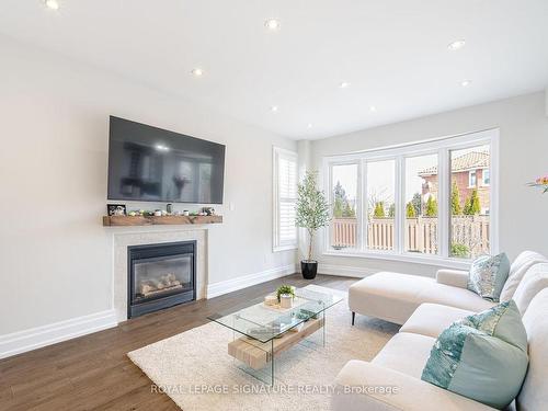 6489 Hampden Woods Rd, Mississauga, ON - Indoor Photo Showing Living Room With Fireplace