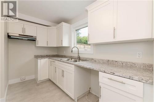 32-34 Laurentide Road, Riverview, NB - Indoor Photo Showing Kitchen With Double Sink