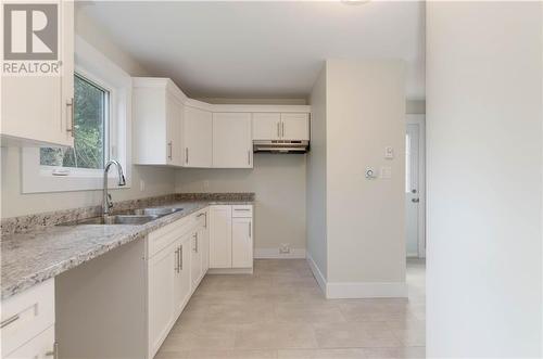 32-34 Laurentide Road, Riverview, NB - Indoor Photo Showing Kitchen With Double Sink