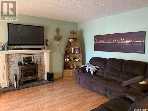 216 Second Avenue W, Hafford, SK - Indoor Photo Showing Living Room With Fireplace