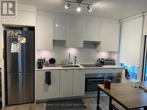 202 - 99 Broadway Avenue, Toronto (Mount Pleasant West), ON - Indoor Photo Showing Kitchen With Upgraded Kitchen