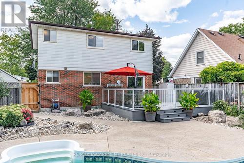 1340 Humphreys Crescent, Burlington (Tyandaga), ON - Outdoor With In Ground Pool With Deck Patio Veranda With Exterior