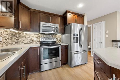 239 4002 Sandhill Crescent, Regina, SK - Indoor Photo Showing Kitchen With Double Sink With Upgraded Kitchen