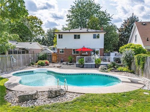 Backyard Oasis - 1340 Humphreys Crescent, Burlington, ON - Outdoor With In Ground Pool With Deck Patio Veranda With Backyard