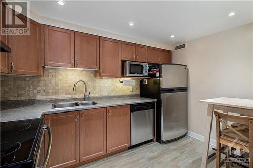 Updated kitchen - 939 North River Road Unit#104, Ottawa, ON - Indoor Photo Showing Kitchen With Double Sink