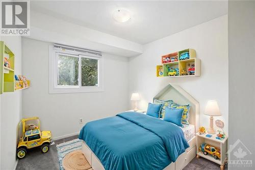 This photo has been virtually staged. - 6247 Sundown Crescent Unit#62, Ottawa, ON - Indoor Photo Showing Bedroom