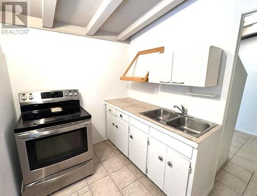 417 Oceanview Drive, Daajing Giids City, BC - Indoor Photo Showing Kitchen With Double Sink