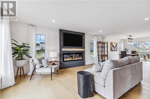 5 Belidor, Moncton, NB - Indoor Photo Showing Living Room With Fireplace