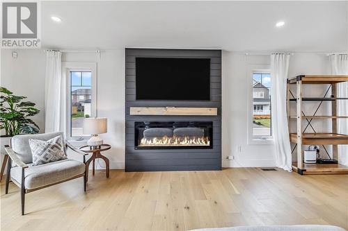 5 Belidor, Moncton, NB - Indoor Photo Showing Living Room With Fireplace