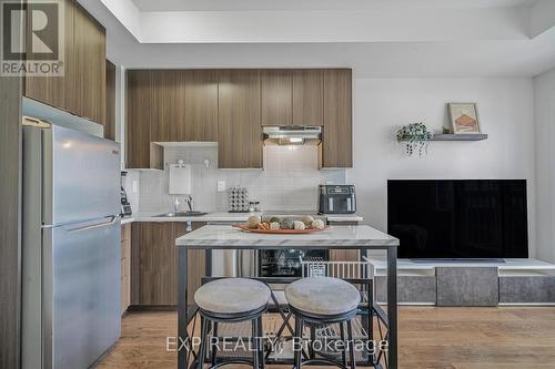 404 - 20 Orchid Place Drive, Toronto (Malvern), ON - Indoor Photo Showing Kitchen With Upgraded Kitchen