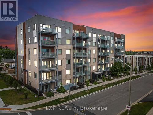 404 - 20 Orchid Place Drive, Toronto (Malvern), ON - Outdoor With Balcony With Facade