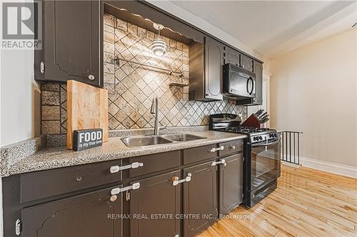 65 Banff Street, Haldimand, ON - Indoor Photo Showing Kitchen With Double Sink