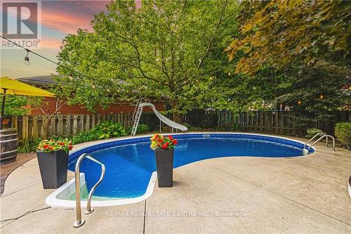 65 Banff Street, Haldimand, ON - Outdoor With In Ground Pool With Backyard