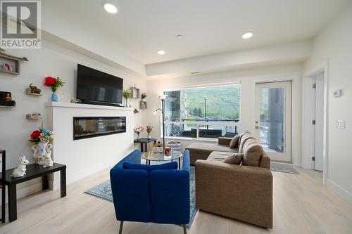 104-651 Dunes Drive, Kamloops, BC - Indoor Photo Showing Living Room With Fireplace