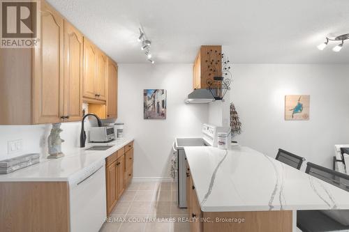 9 - 3 Paradise Boulevard, Ramara (Brechin), ON - Indoor Photo Showing Kitchen