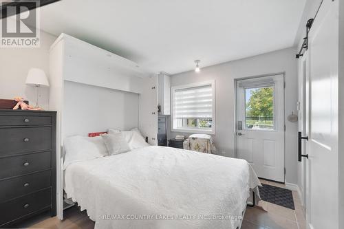 9 - 3 Paradise Boulevard, Ramara (Brechin), ON - Indoor Photo Showing Bedroom