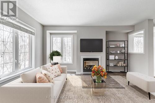 266 - 7360 Zinnia Place, Mississauga (Meadowvale Village), ON - Indoor Photo Showing Living Room With Fireplace