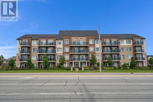 311 - 54 Sky Harbour Drive, Brampton (Bram West), ON - Outdoor With Balcony With Facade