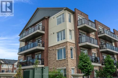 311 - 54 Sky Harbour Drive, Brampton (Bram West), ON - Outdoor With Balcony With Facade