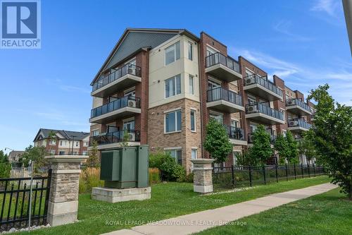 311 - 54 Sky Harbour Drive, Brampton (Bram West), ON - Outdoor With Balcony With Facade