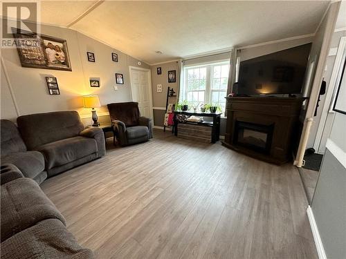 4 Hummingbird Street, Moncton, NB - Indoor Photo Showing Living Room With Fireplace