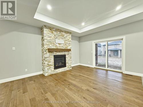 19 Tracy Drive, Chatham-Kent (Chatham), ON - Indoor Photo Showing Living Room With Fireplace