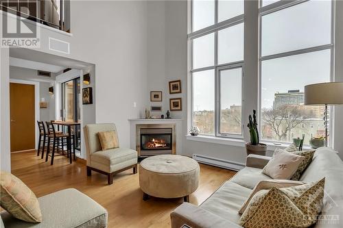 29 Main Street Unit#303, Ottawa, ON - Indoor Photo Showing Living Room With Fireplace