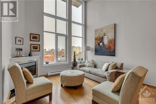 29 Main Street Unit#303, Ottawa, ON - Indoor Photo Showing Living Room With Fireplace