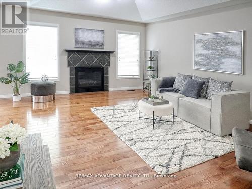 9 - 100 Stroud Crescent, London, ON - Indoor Photo Showing Living Room With Fireplace