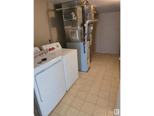 8269 29 Av Nw, Edmonton, AB - Indoor Photo Showing Laundry Room