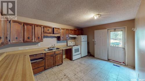 1758 Winnipeg Street, Regina, SK - Indoor Photo Showing Kitchen With Double Sink