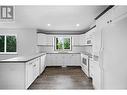 5292 Kallum Drive, 108 Mile Ranch, BC  - Indoor Photo Showing Kitchen With Double Sink 