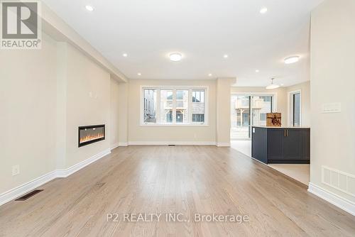 101 Bearberry Road, Springwater (Midhurst), ON - Indoor Photo Showing Living Room With Fireplace